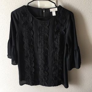 Black 3/4 blouse with front detail, worn once.